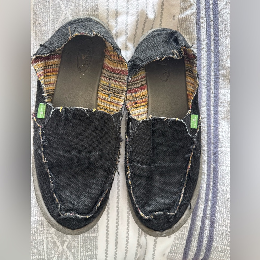 Sanuk Black Slip-On Shoes with Colorful Trim